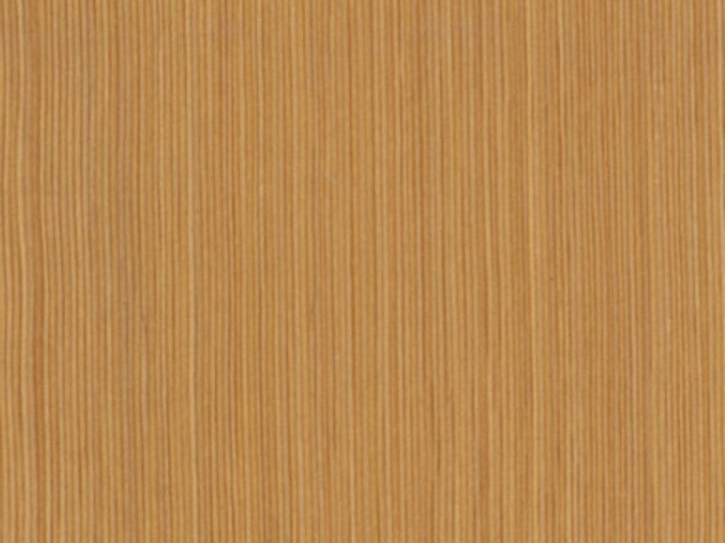 Tightly spaced grain lines on a rich, orange-toned Douglas fir board, highlighting the wood’s natural warmth and clarity.